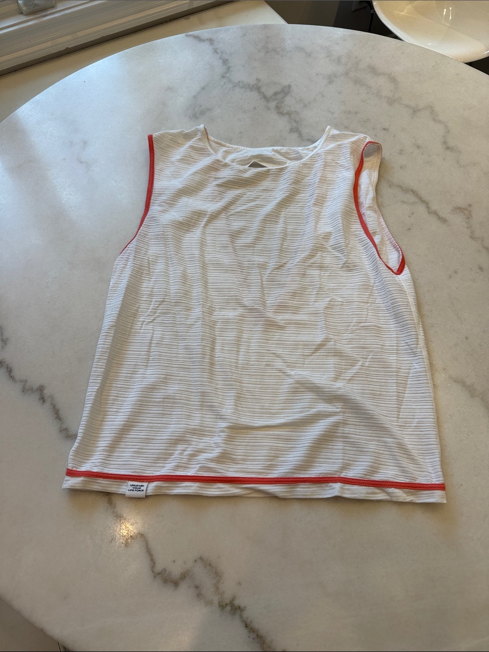 Vimmia White Muscle Tank with Orange Trim and cut out back. Semi sheer